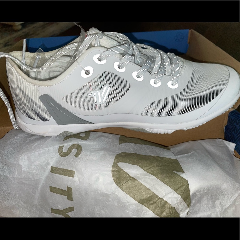 White Varsity cheerleading shoes. NWT